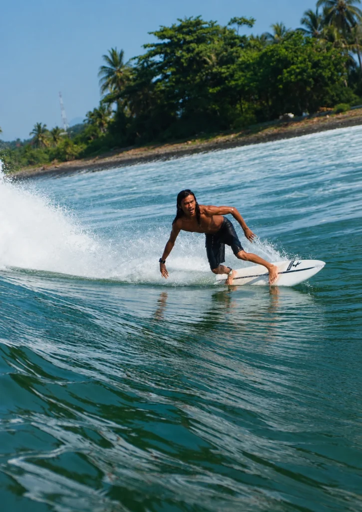 Local surf coach and student at Iron Wave Uluwatu, Uluwatu Bali