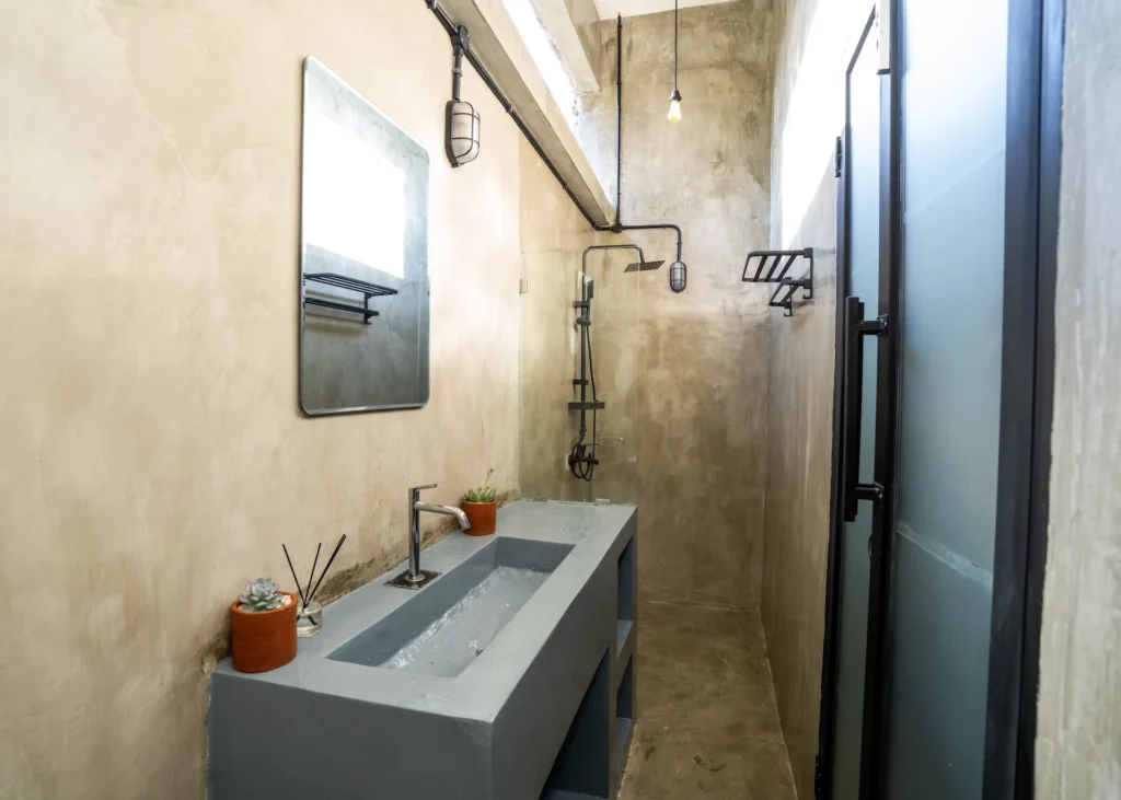 Shared dorm bathroom at Iron Wave Uluwatu surf hostel — photo 1