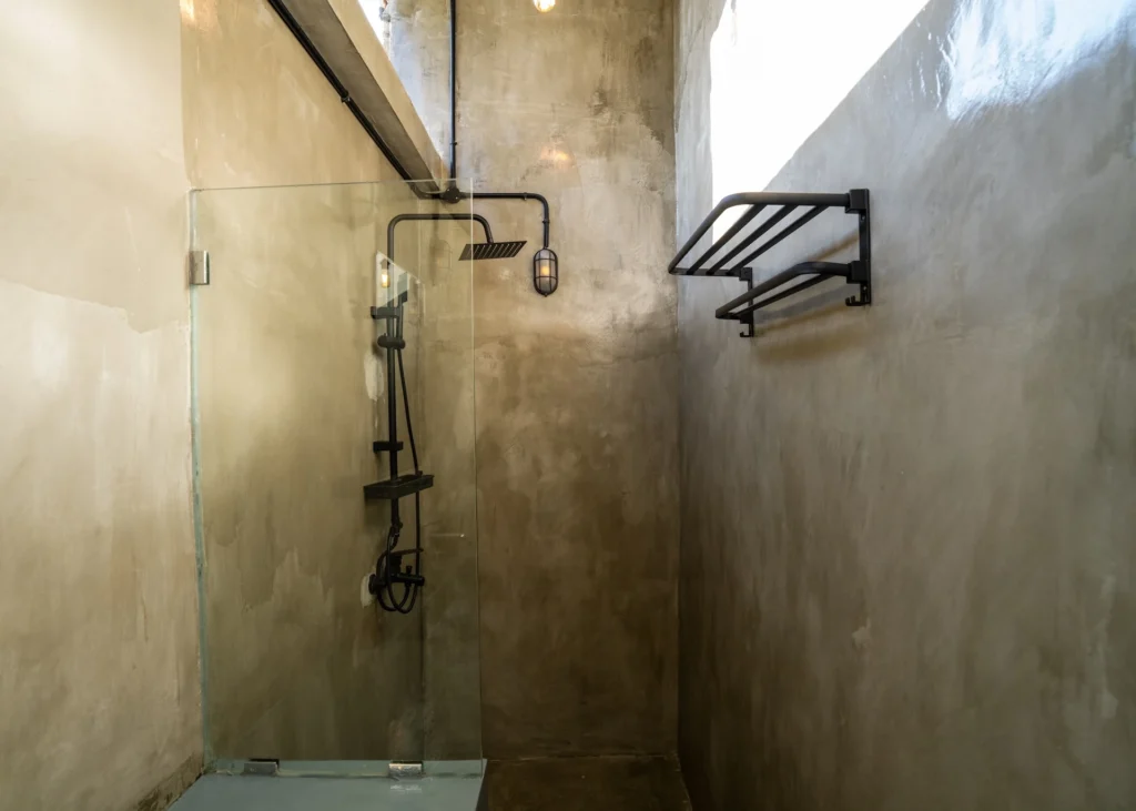 Shared dorm bathroom at Iron Wave Uluwatu surf hostel — photo 2