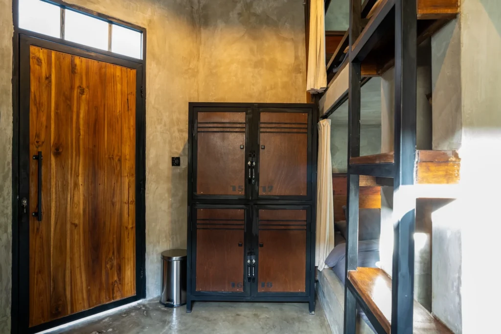 Concrete bunk bed in the Mix Dorm Room at Iron Wave Uluwatu surf hostel — photo 13
