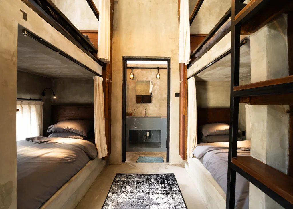 Concrete bunk bed in the Female Dorm Room at Iron Wave Uluwatu surf hostel — photo 1