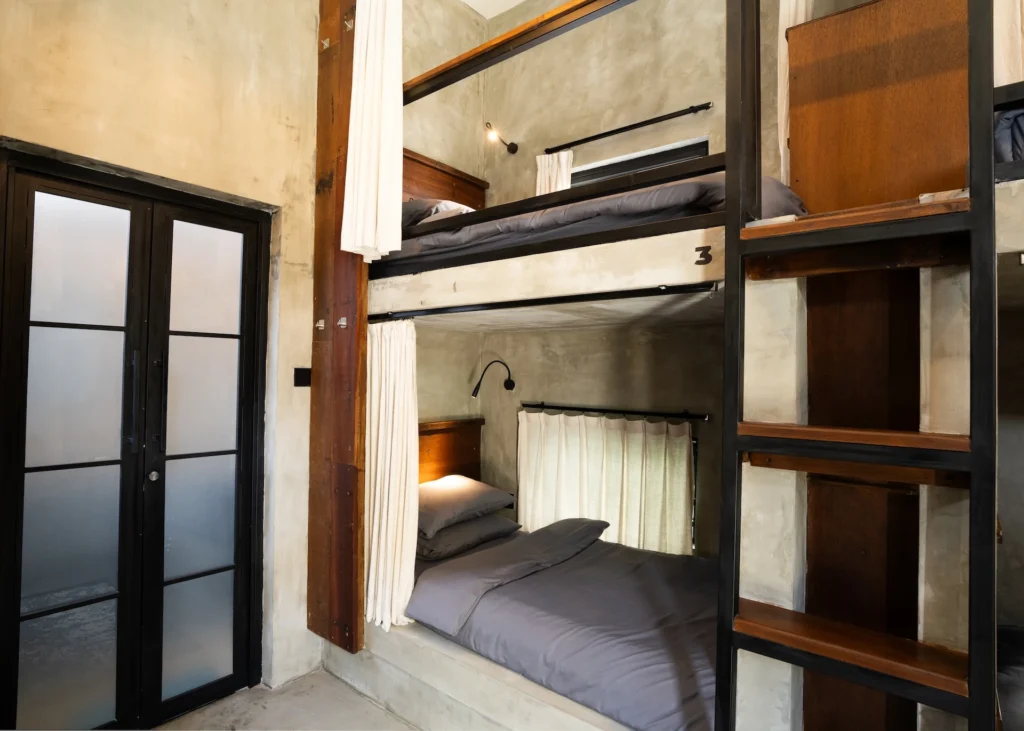 Concrete bunk bed in the Female Dorm Room at Iron Wave Uluwatu surf hostel — photo 3