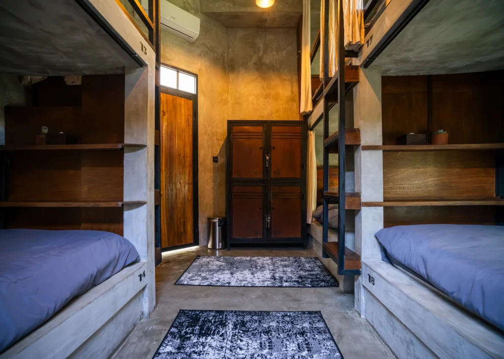 Concrete bunk bed in the Mix Dorm Room at Iron Wave Uluwatu surf hostel — photo 2